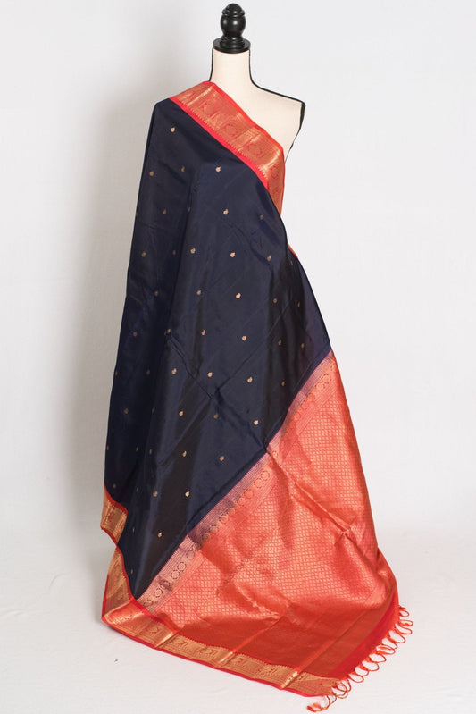 Midnight Blue and Peach Kanjivaram Silk Saree – Kalyani — draped on a mannequin, back view