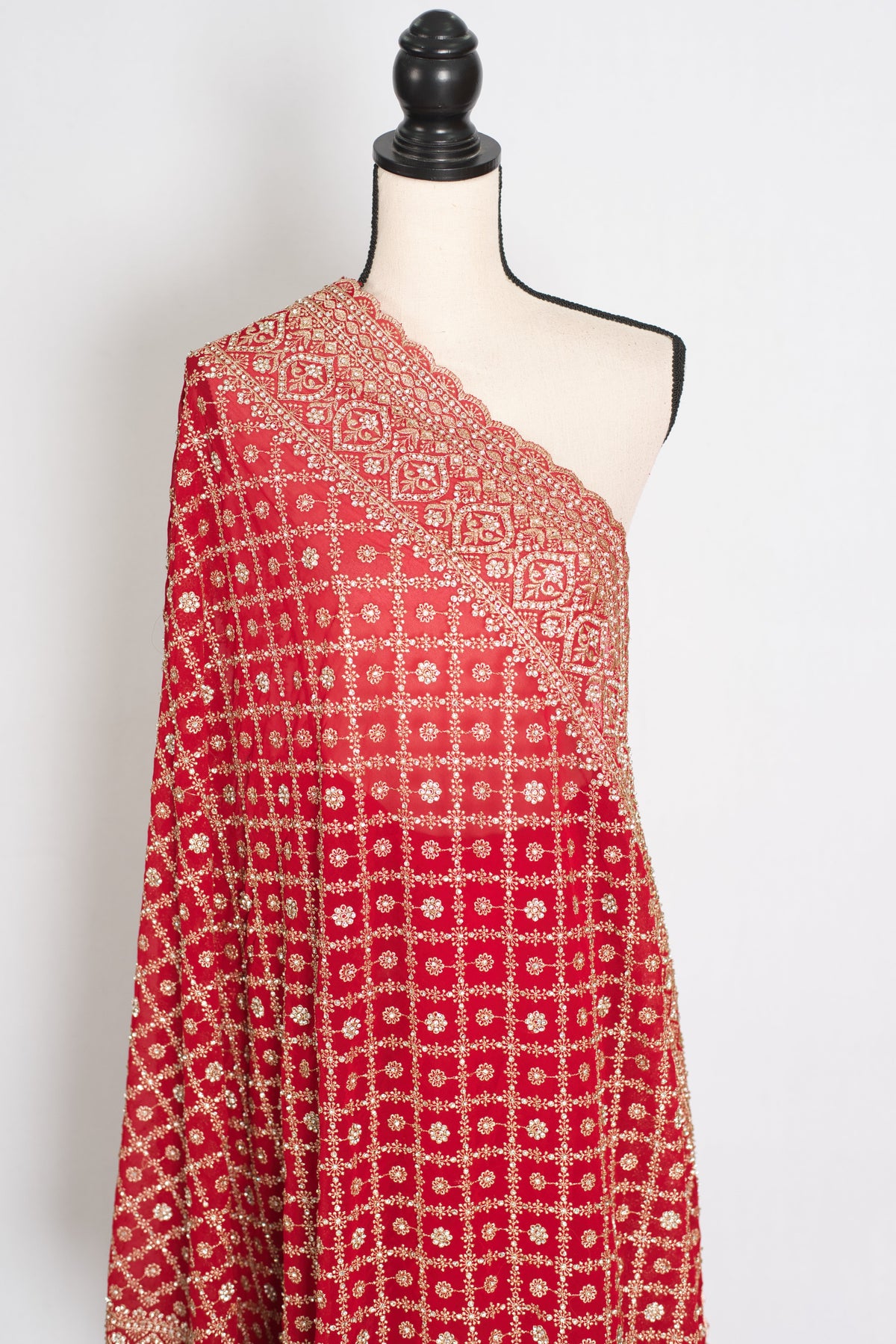 Eva Red & Gold Georgette Festive Saree — close view of the upper drape on a mannequin